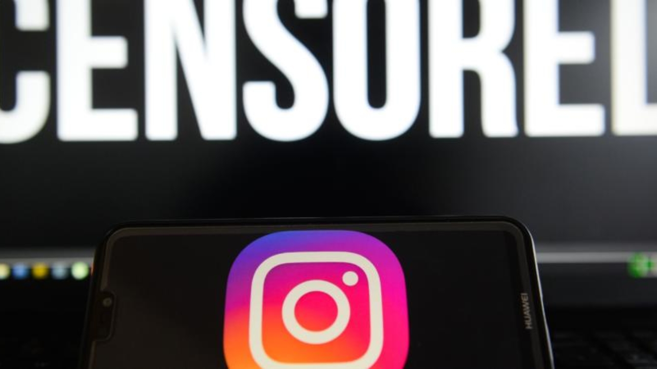 August 17, 2018 - Krakow, Poland - Instagram logo is seen on a Huawei smart phone with the word censored on a laptop monitor. (Credit Image: © Omar Marques/SOPA Images via ZUMA Wire)